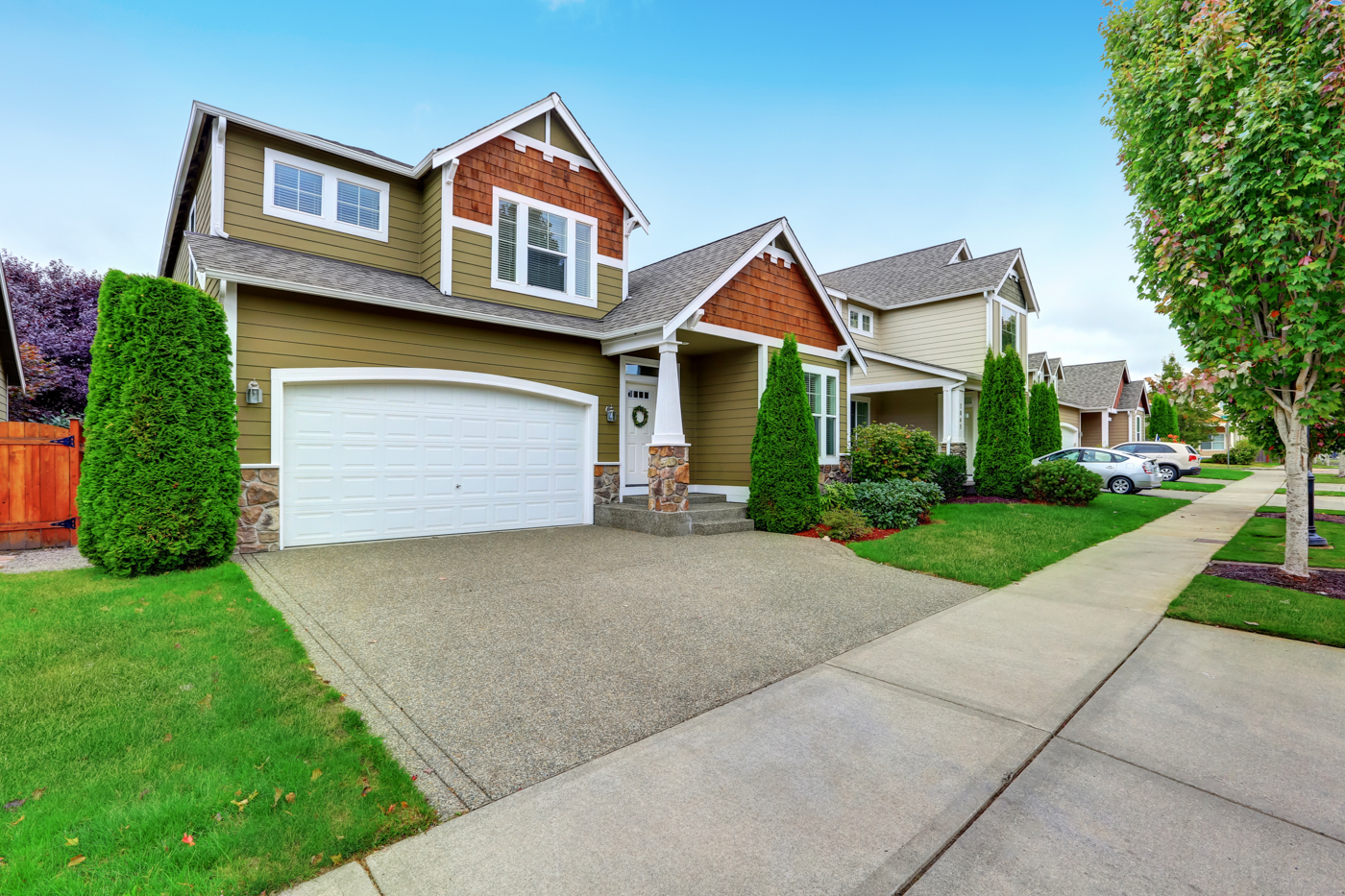 Double insulated garage doors on Canadian home driveway