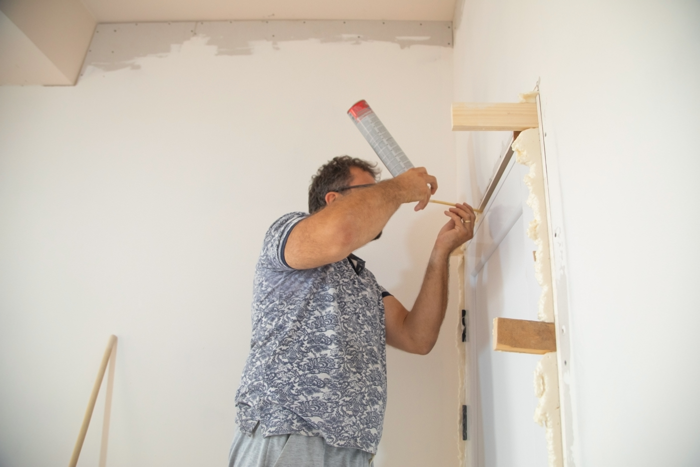 Closet door repair with drill by Fix Experts technician