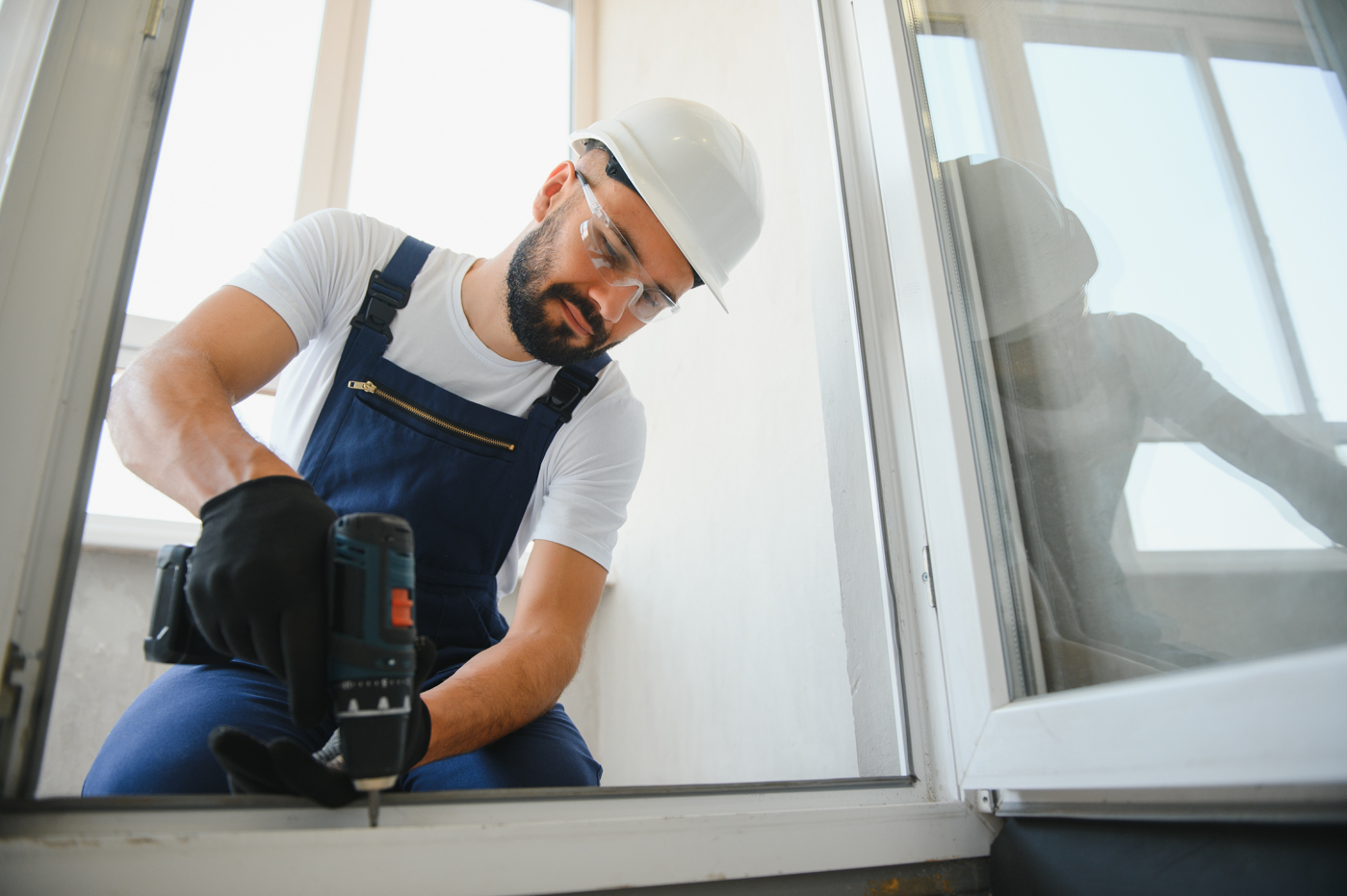 Fix Experts installing energy-efficient window in Canadian home