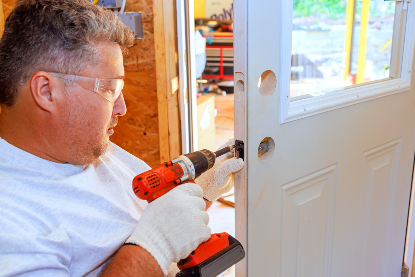 Locksmith installing secure mailbox lock mechanism