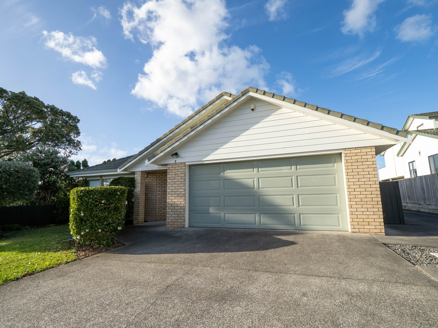 Modern residential garage doors on Canadian home exterior