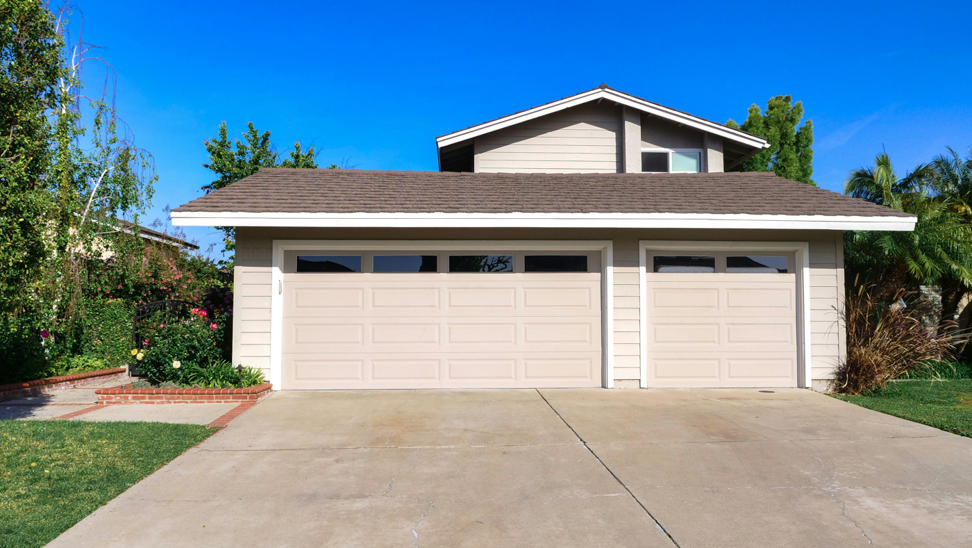 Residential garage with white door