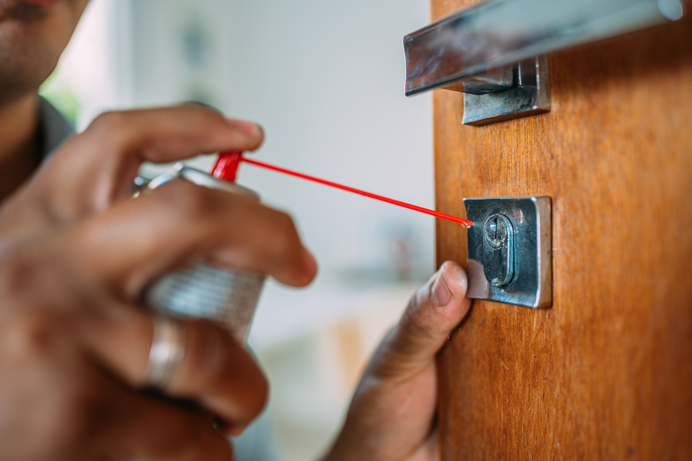 Locksmith installing door handle onsite