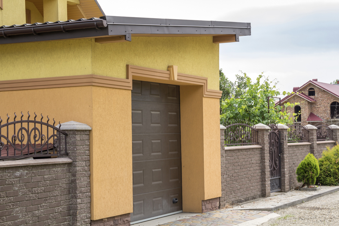 Traditional white garage door, residential home