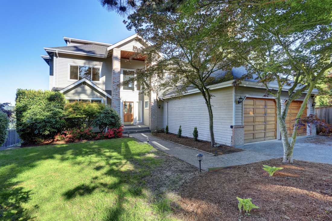 Modern brick home with garage door